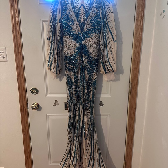 Elegant Sheer Illusion Gown with Teal Sequin Accents - Picture 9 of 11
